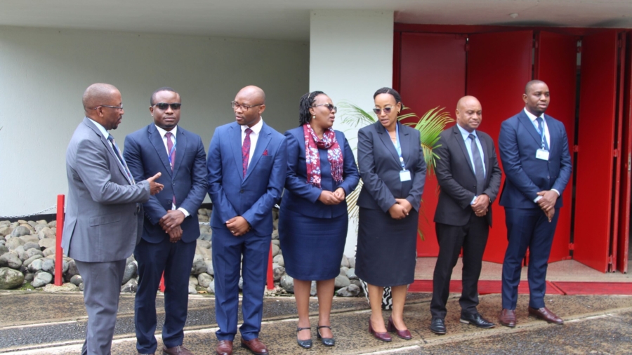 The APS-HRMnet President Africa and Deputy Permanent Secretary-President’s Office Public Service Management and Good Governance Mr. Xavier M. Daudi (First left), in a discussion with Leaders while waiting for the arrival of the Guest of Honour at Arusha International Conference Centre on 6th May, 2024.