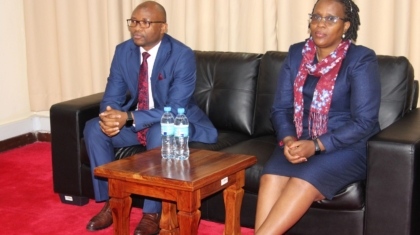 Deputy President of APS-HRMnet Africa Mr. James Wasagami and the Vice President of APS-HRMnet for Eastern Block Ms. Florence Wanguku following APS-HRMnet President Mr. Xavier M. Daudi when briefing them on TPS-HRMnet inauguration schedule at Arusha International Conference Center, Arusha Tanzania.